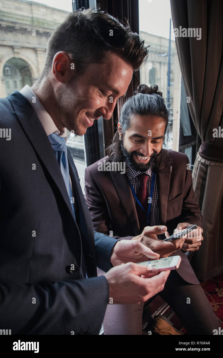 Businessmen Swapping Contact Details Stock Photo