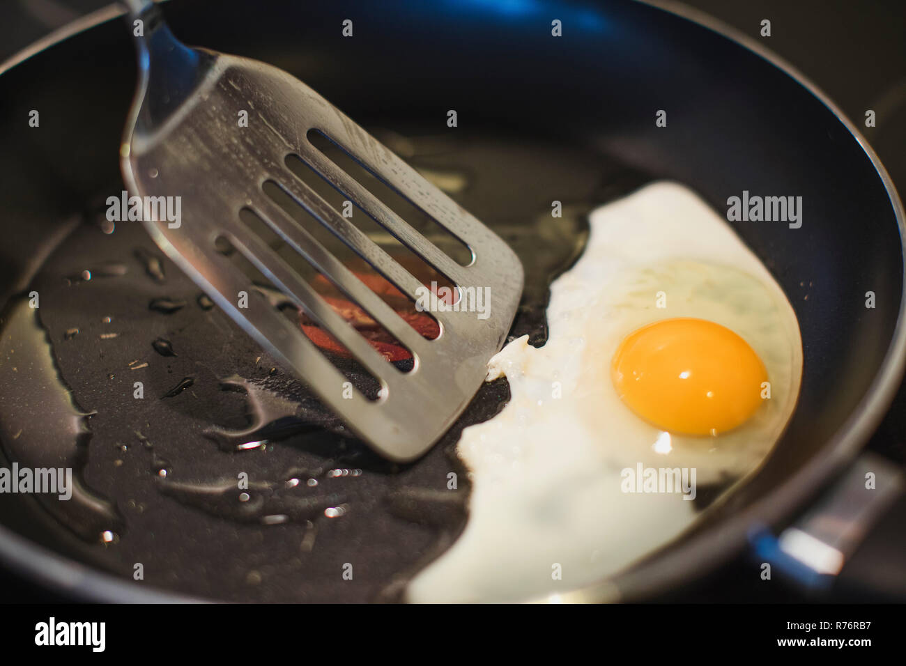 Frying an Egg Stock Photo Alamy