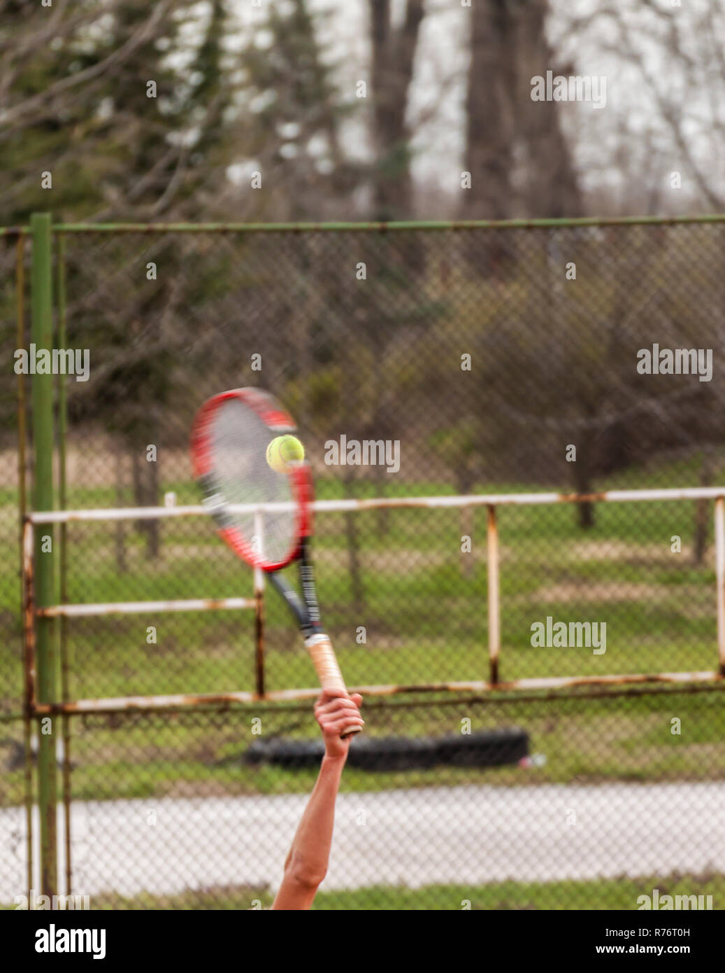 Tennis racket hitting a tennis ball Stock Photo Alamy