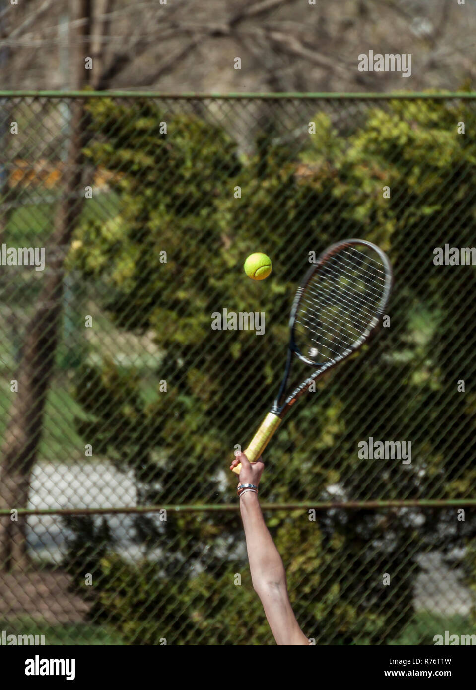 Tennis racket hitting a tennis ball Stock Photo Alamy