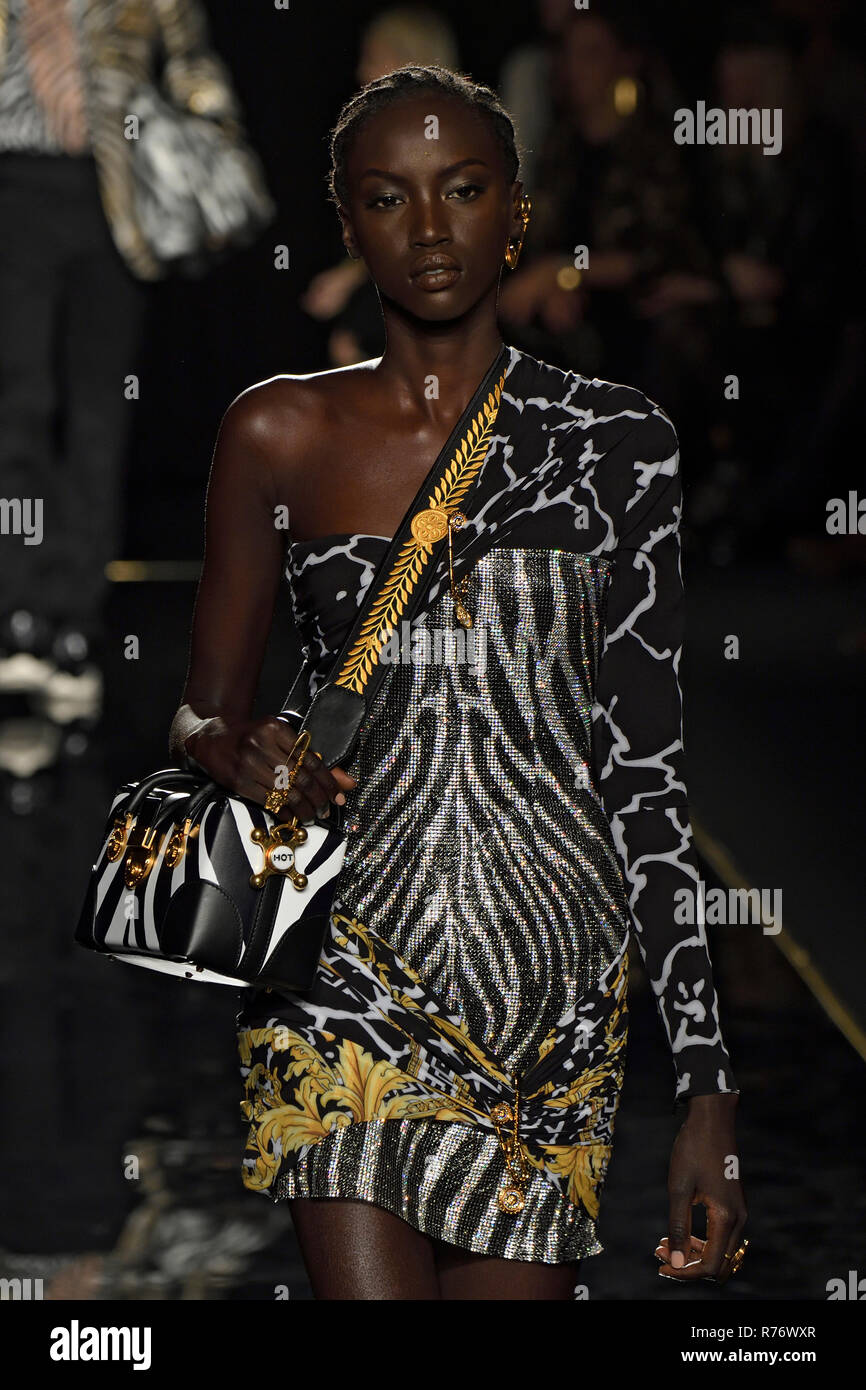 NEW YORK, NY - DECEMBER 02: Model Anok Yai walks the runway at the Versace  Pre-Fall 2019 Collection at The American Stock Exchange on December 02, 201  Stock Photo - Alamy