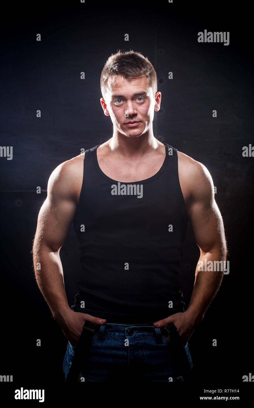 Young muscular man Stock Photo - Alamy