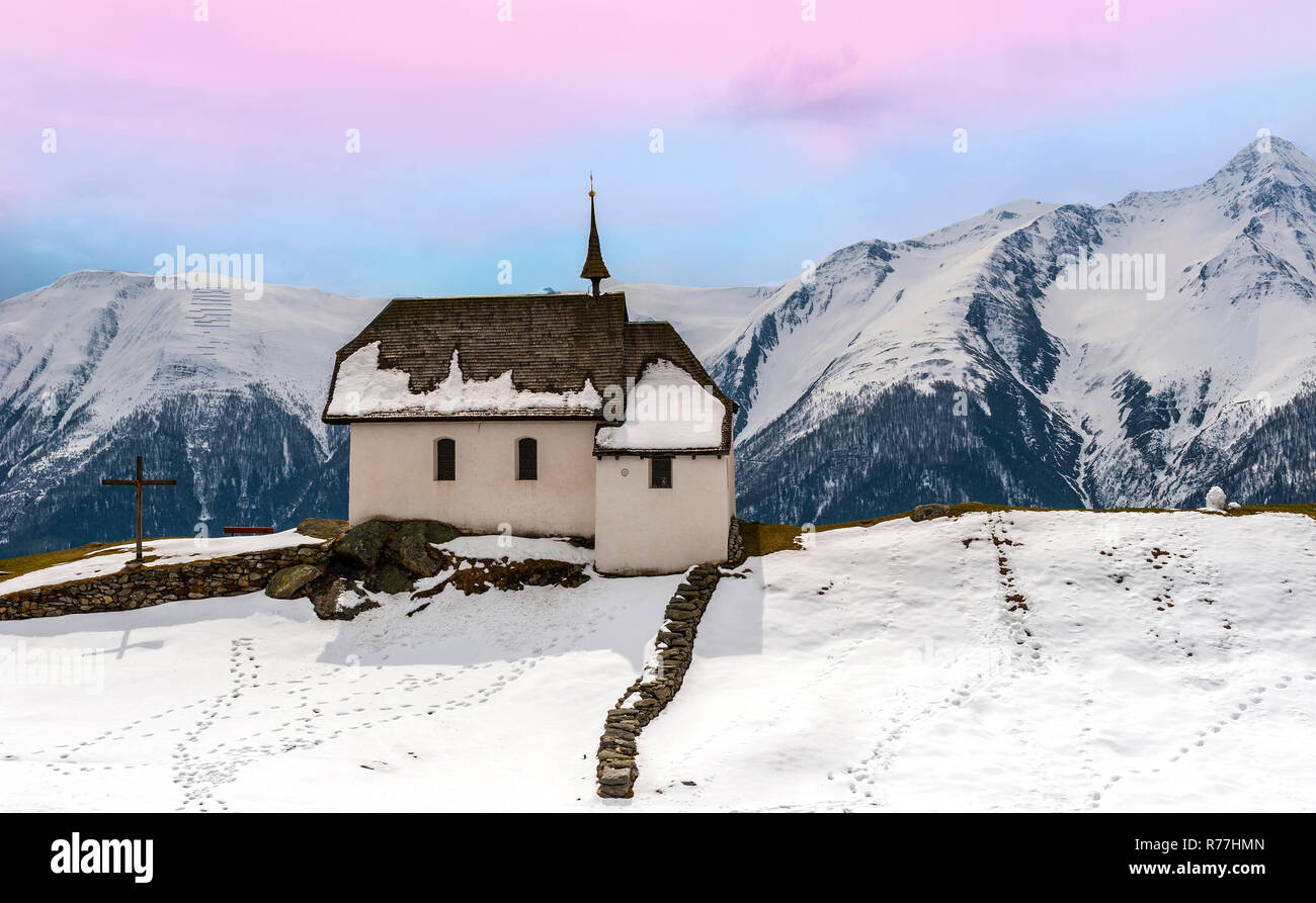 View on the local church in Bettmeralp village in Swiss Alps Stock Photo