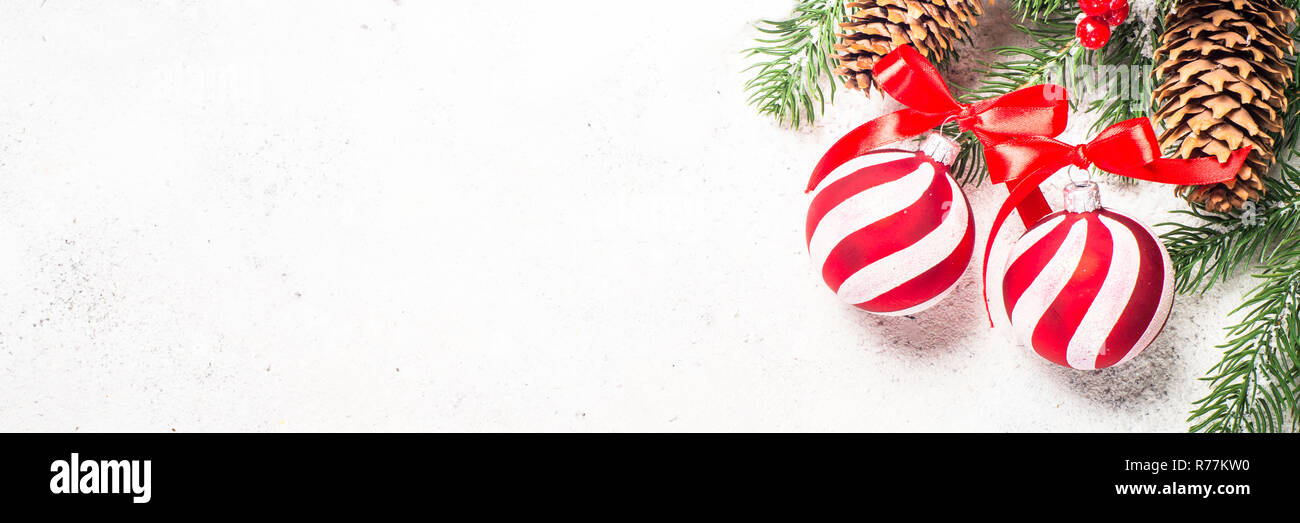 Christmas background with fir tree, red balls and decorations on Stock Photo