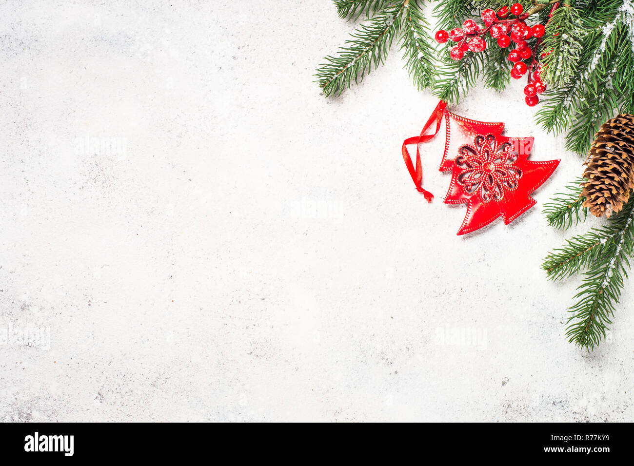 Christmas background with fir tree and cones on white backgroun Stock ...