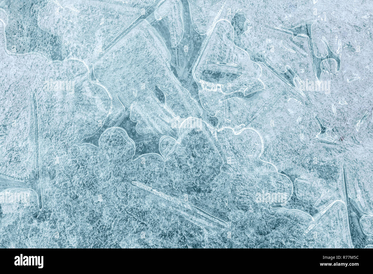 Natural frosty background. ice crystal block with cracks and patterns, textured backdrop Stock Photo