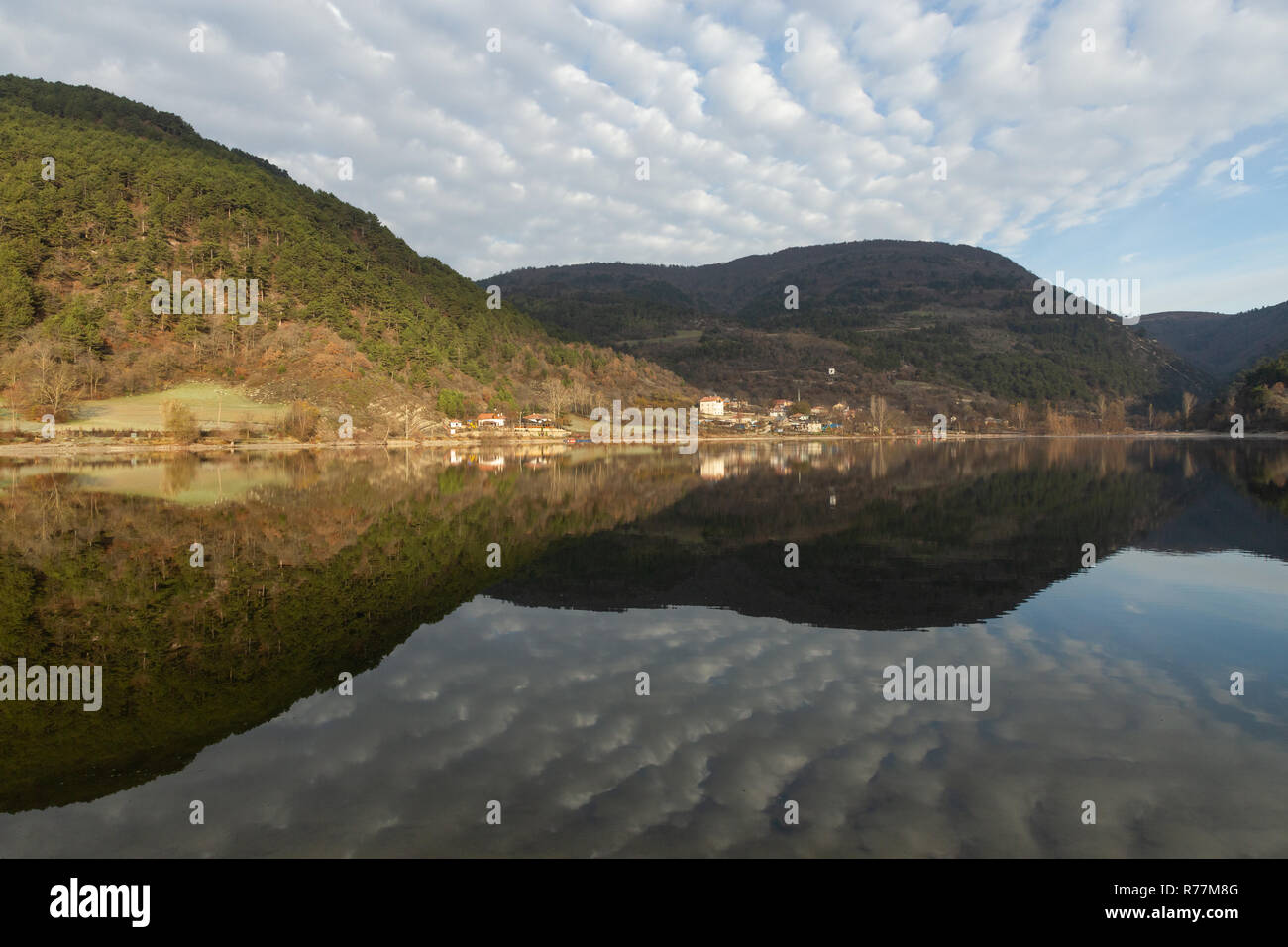 reflection of the village of Çubuklu in the still waters of Çubuklu lake in the Bolu mountains Stock Photo