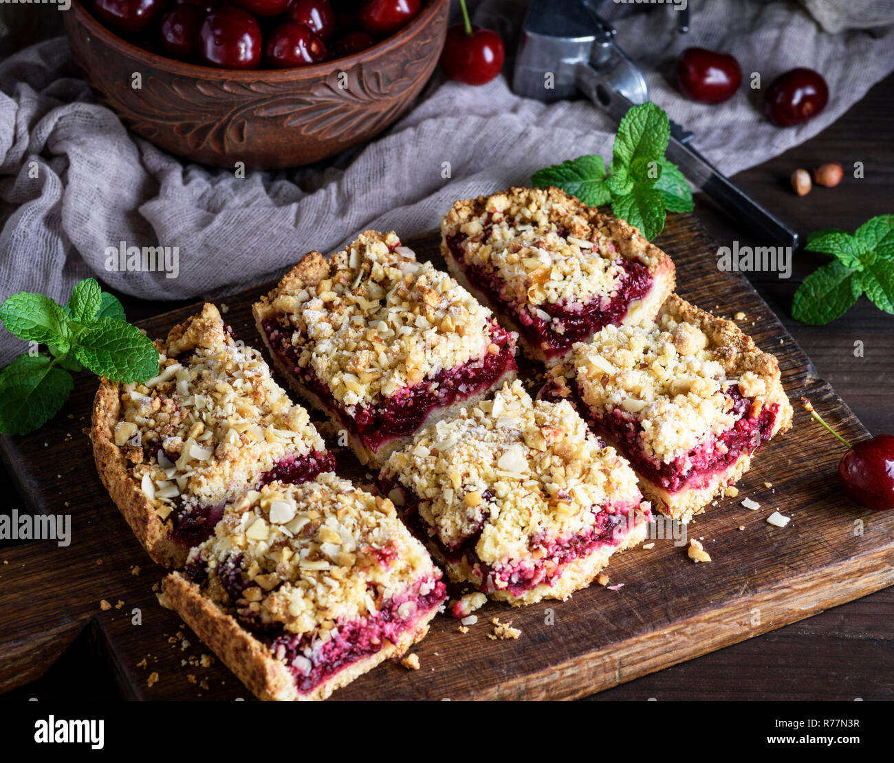 square pieces of cake crumble on brown wooden board Stock Photo