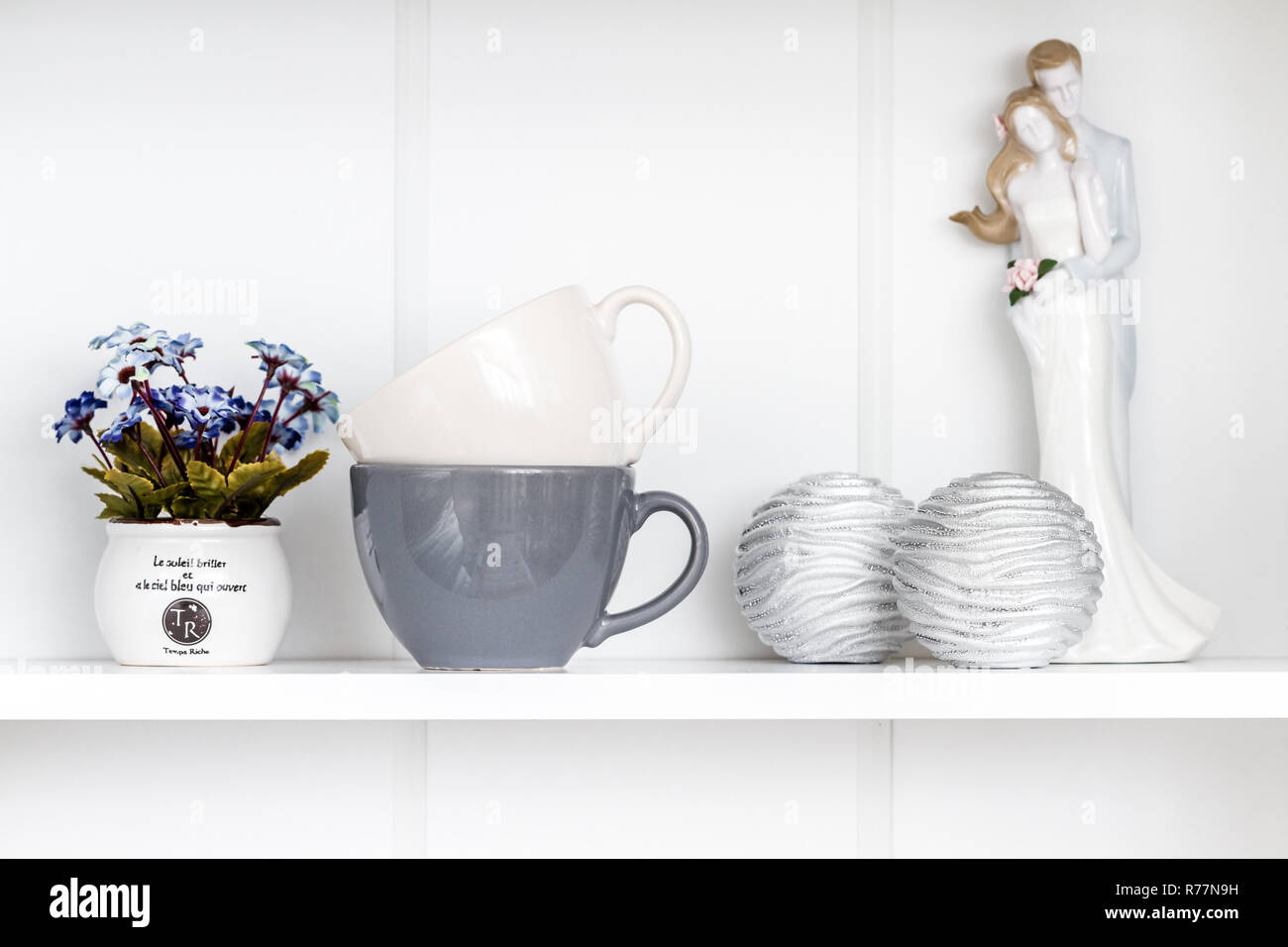 Decorative Objects on White Shelf Stock Photo Alamy