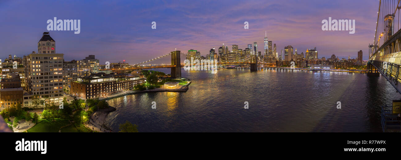 Brooklyn Bridge and Lower Manhattan skyline at night, New York city, USA. Stock Photo