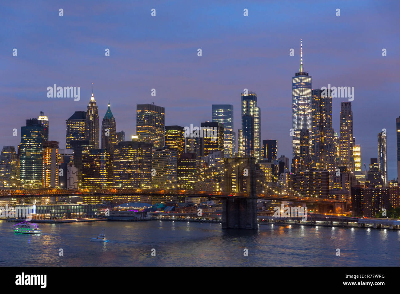 Brooklyn Bridge and Lower Manhattan skyline at night, New York city, USA. Stock Photo