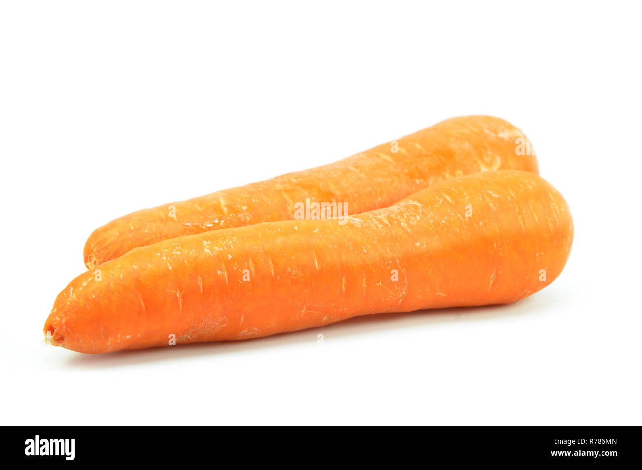 Whole orange carrot isolated Stock Photo Alamy