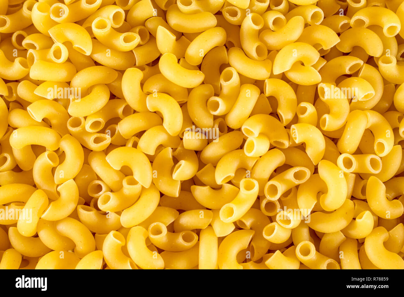 Pasta unprepared horns for all photos. Close-up Stock Photo