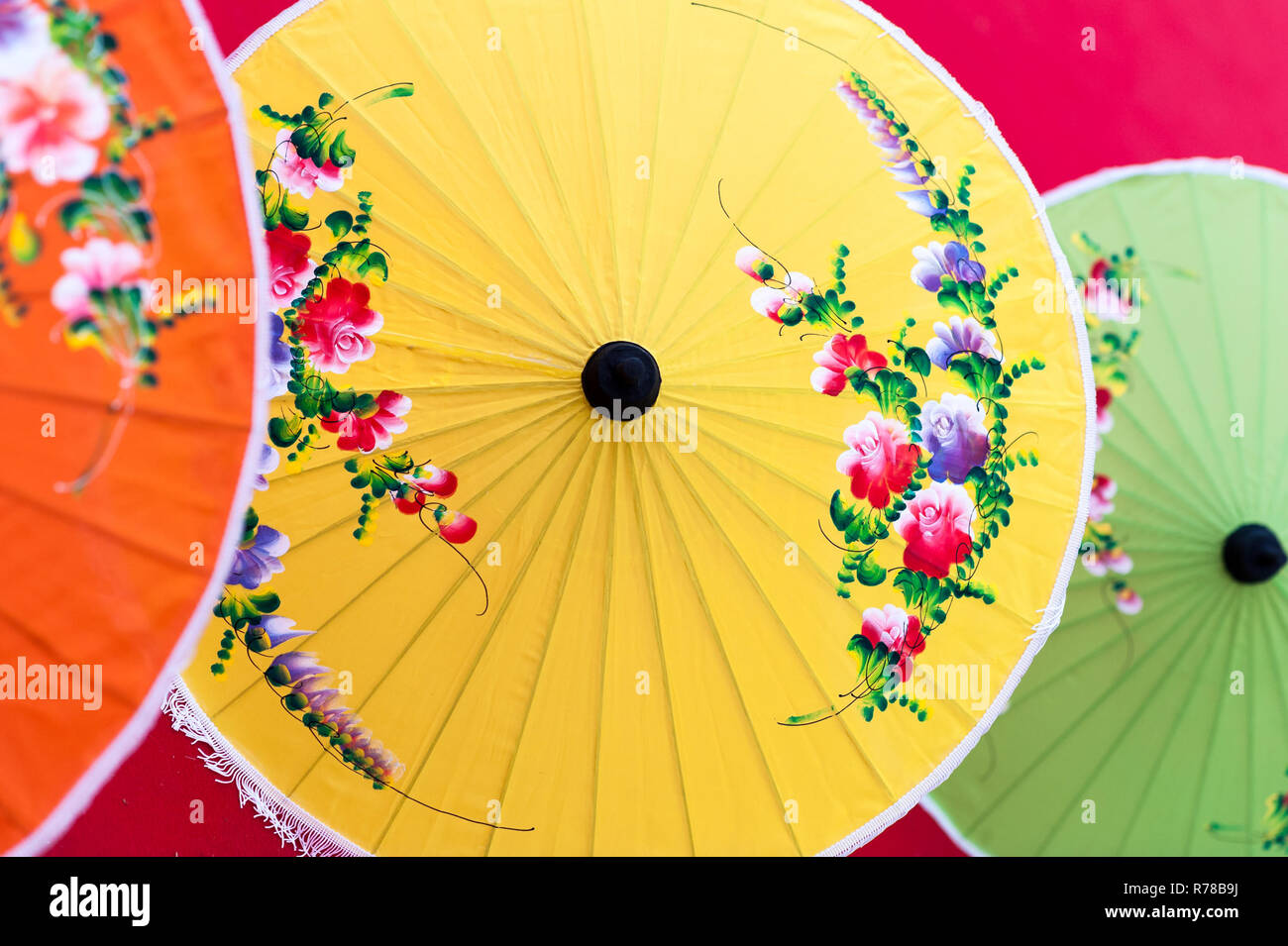 Oriental paper umbrellas of various colors. Stock Photo