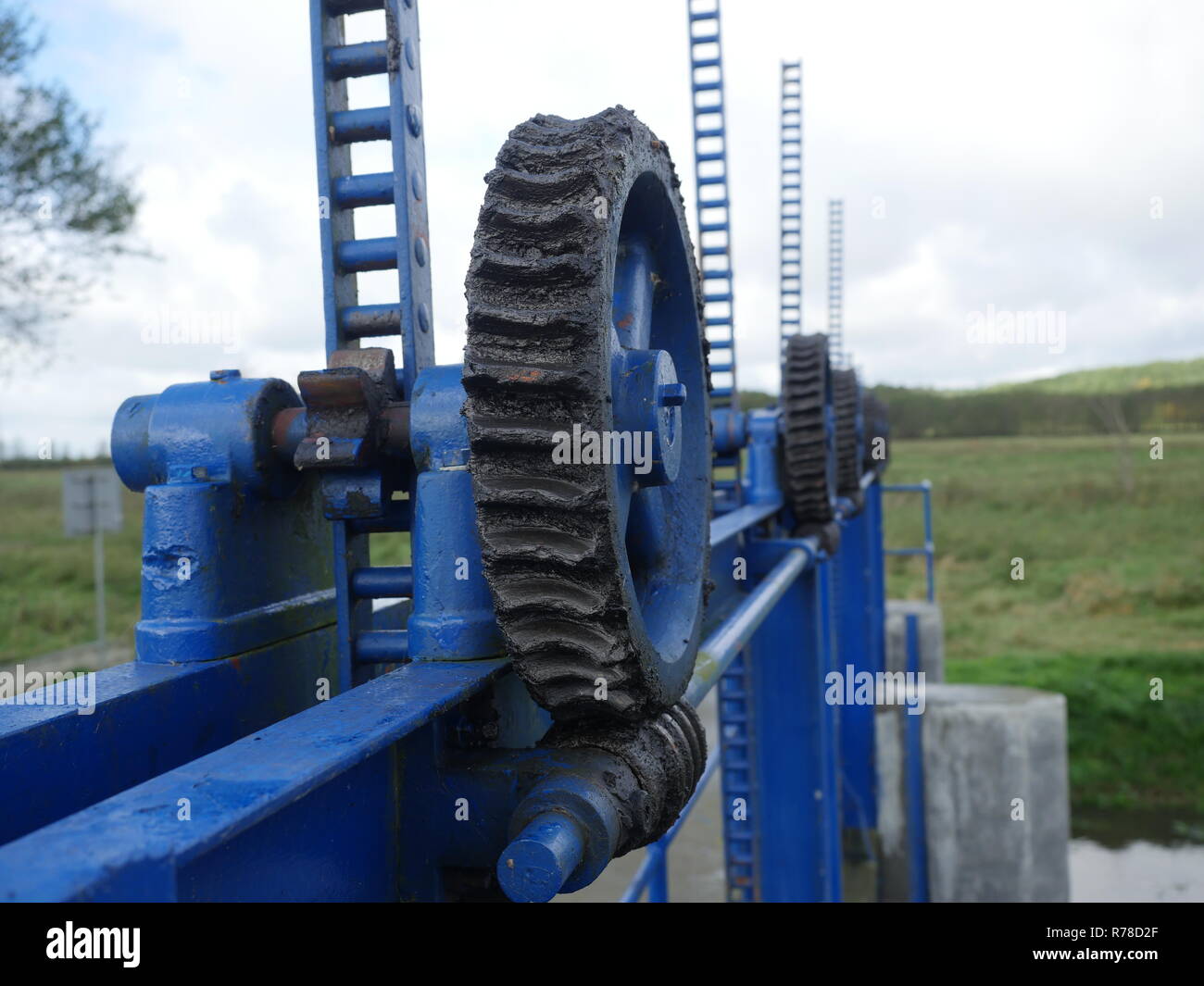 water barrier lifting mechanism with toothed wheels Stock Photo Alamy