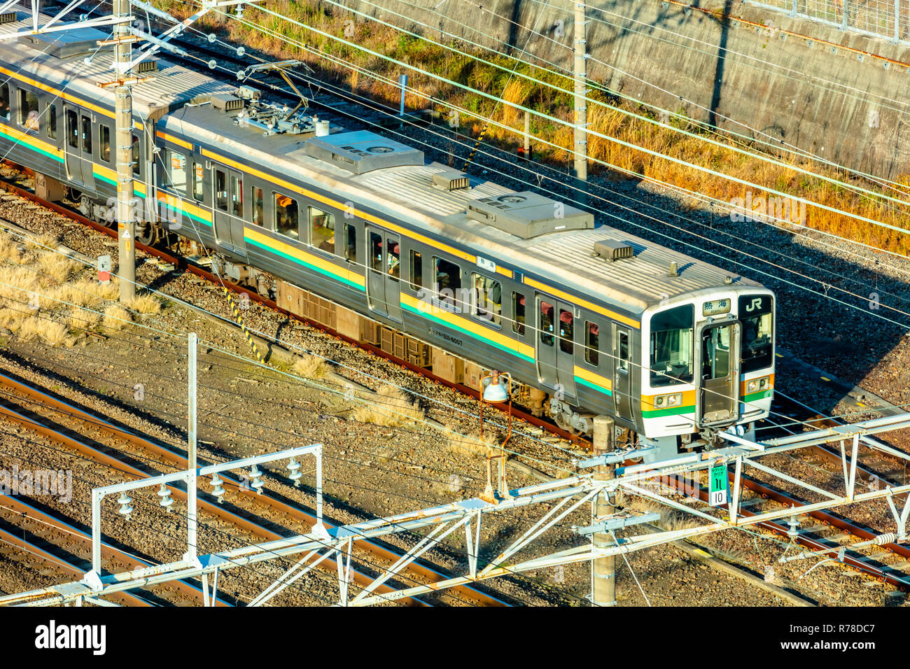 Mishima, Shizuoka / Japan - December 1 2018: Mishima city centre dense buildings featuring Mishima JR railway trains Stock Photo
