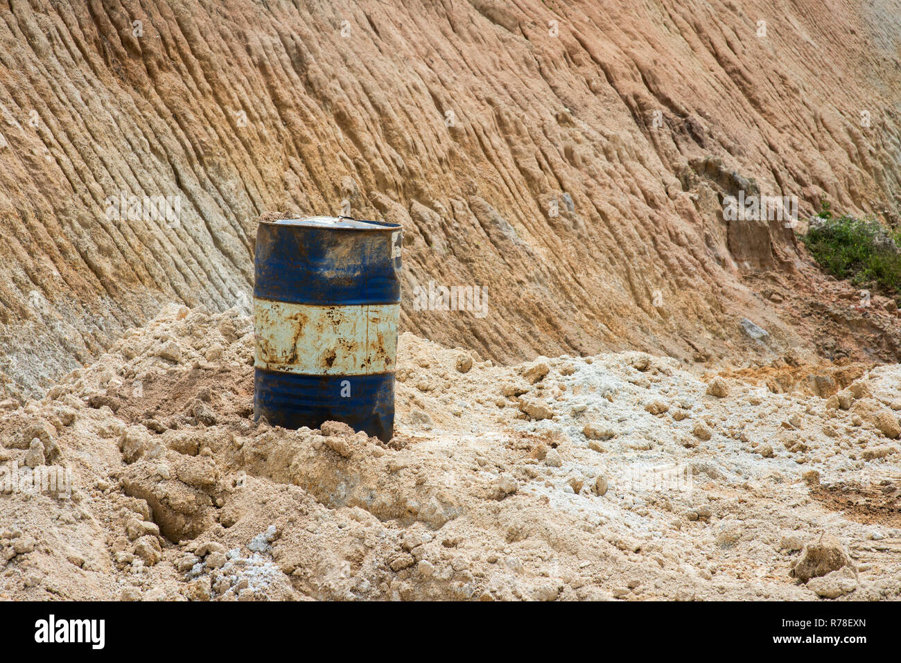 Oil drum on sand mines Stock Photo Alamy
