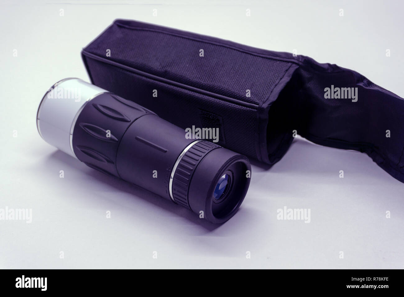 Monocular on the wooden background summer telescopic Stock Photo