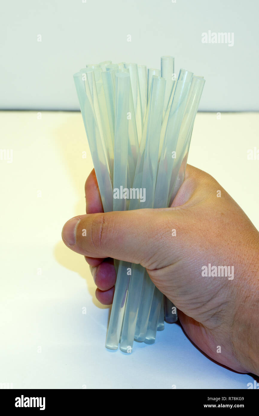 White hot glue sticks for handmade DIY Stock Photo Alamy
