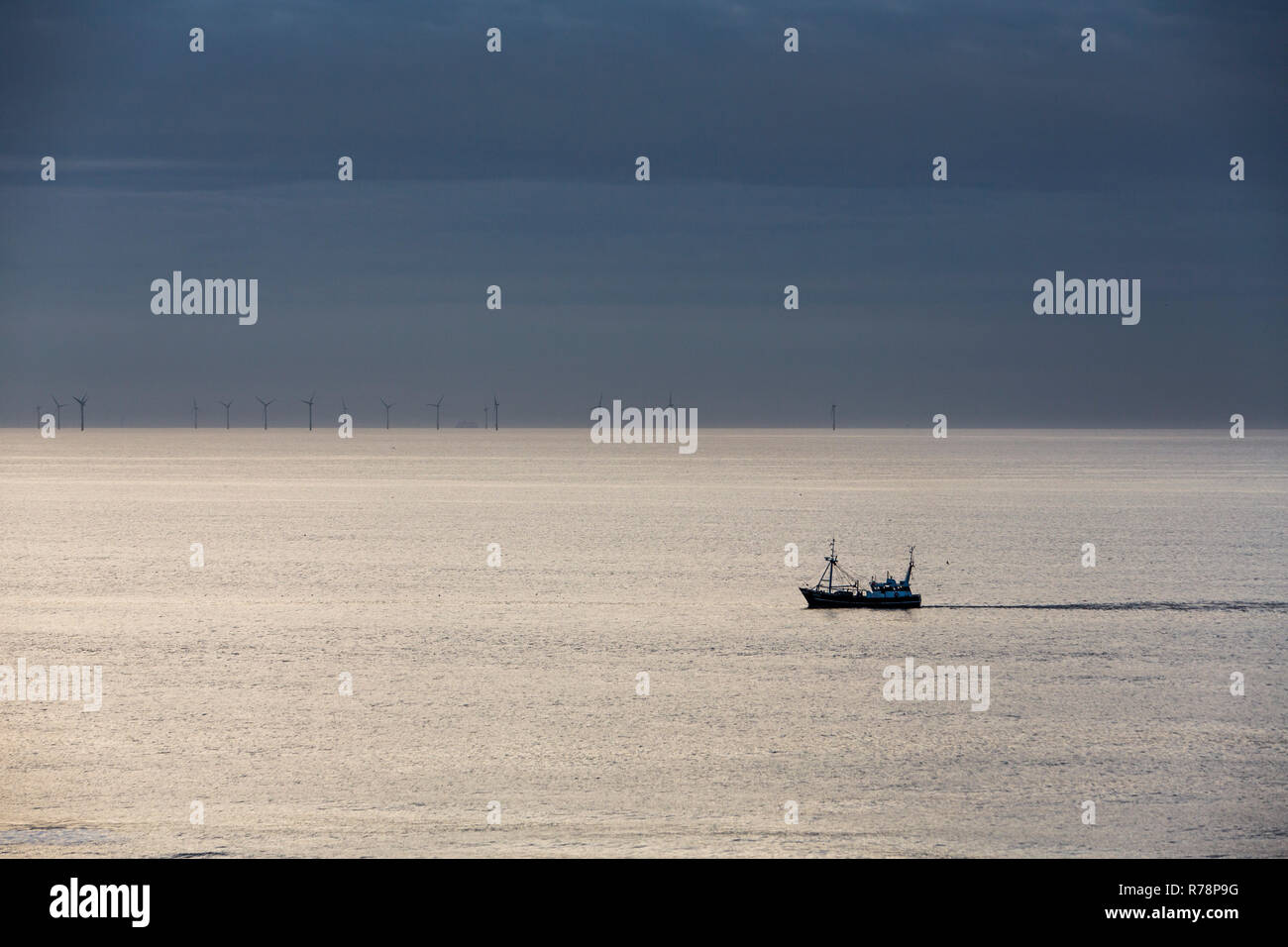 Trawler in the North Sea, off the northern Dutch coast, offshore wind
