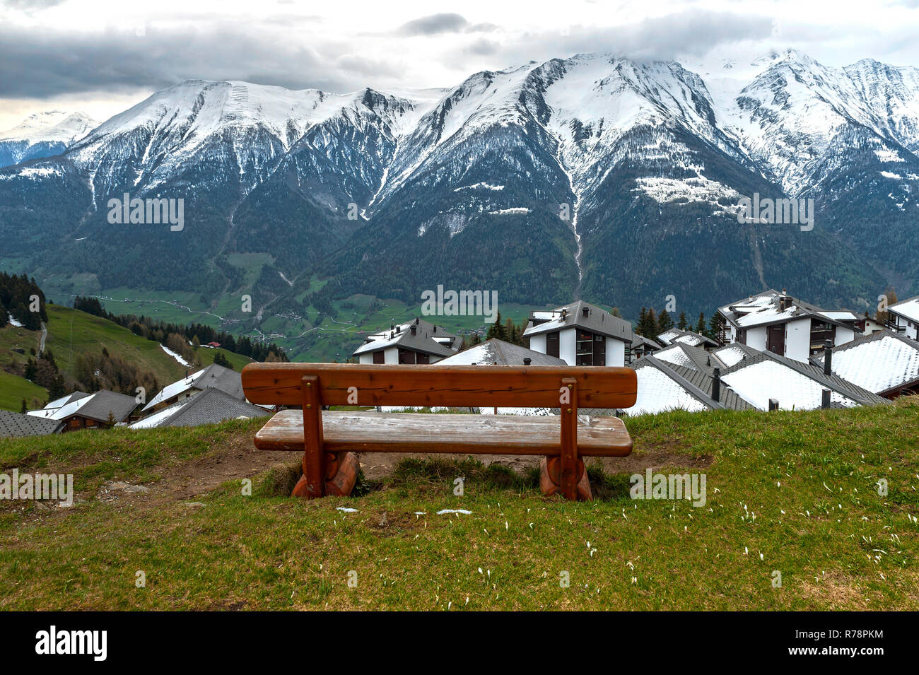 Bench with a view in Bettmeralp village in Swiss Alps Stock Photo