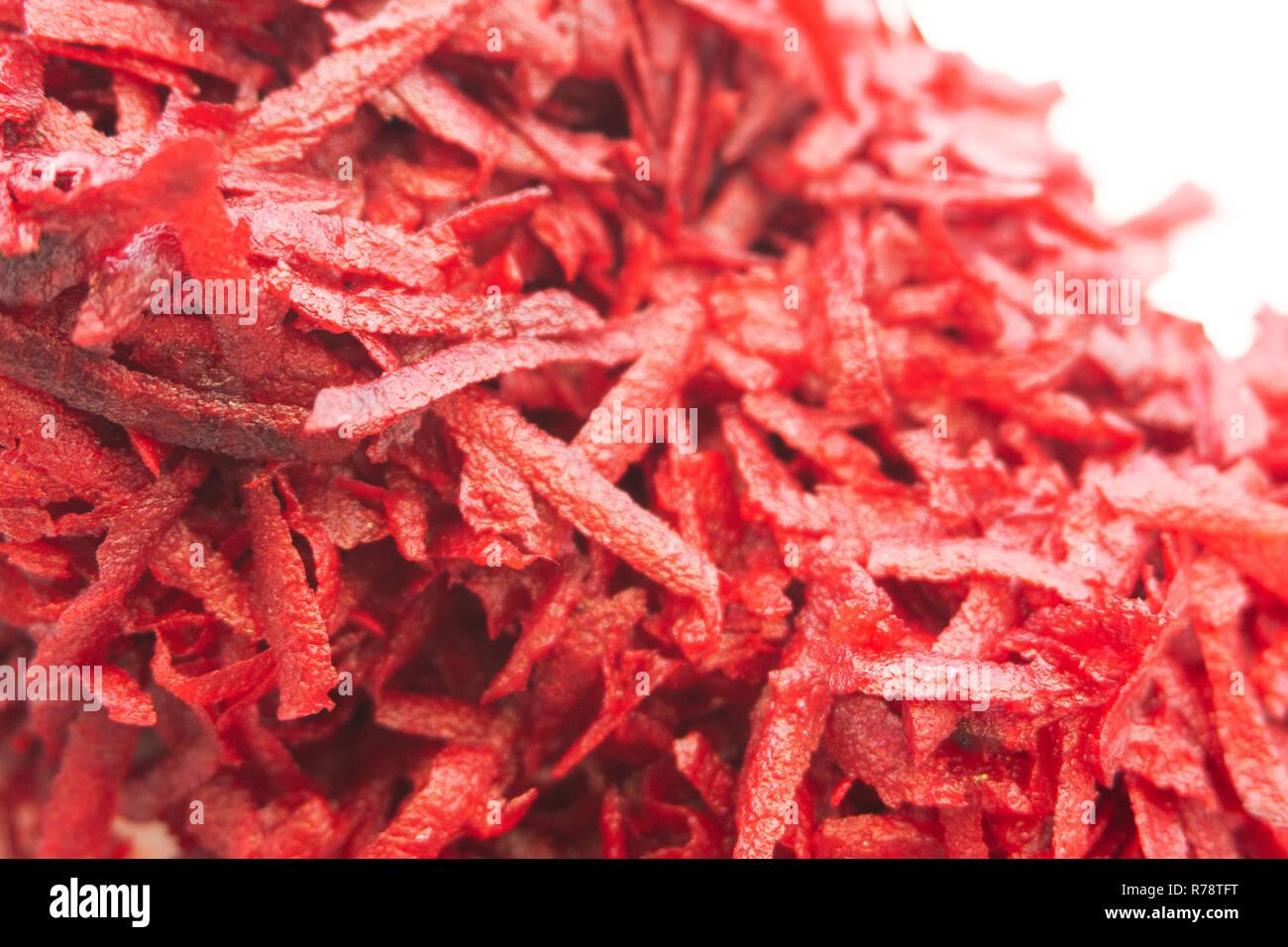 grated beets on a white background slice Stock Photo