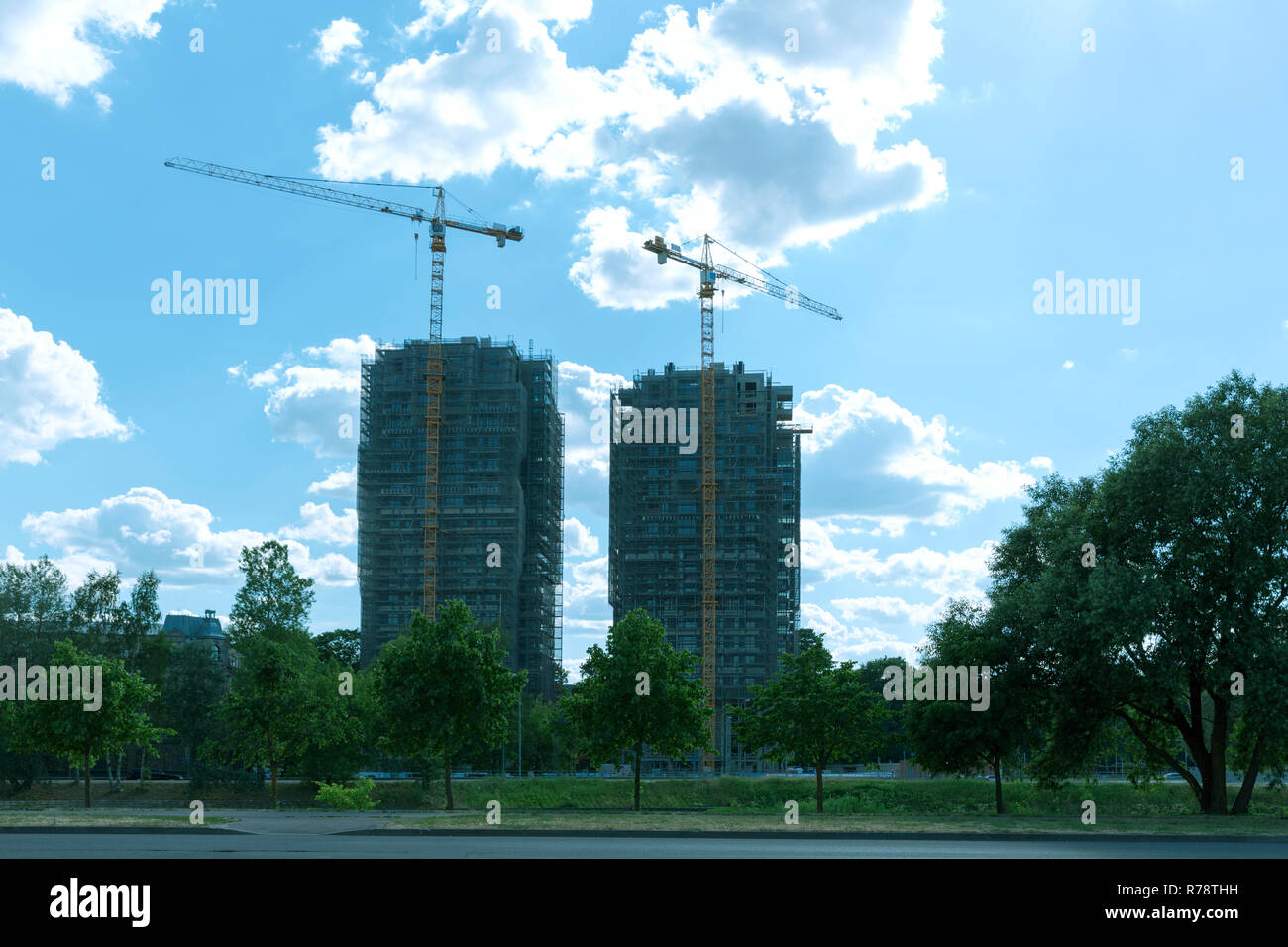 Modern architecture. Construction of skyscraper. Construction site with cranes Stock Photo