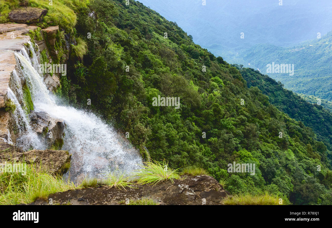 Seven Sisters waterfalls surrounded by the thick forested slopes of the Khasi hills in the monsoon season near Cherrapuji, Meghalaya, India. Stock Photo