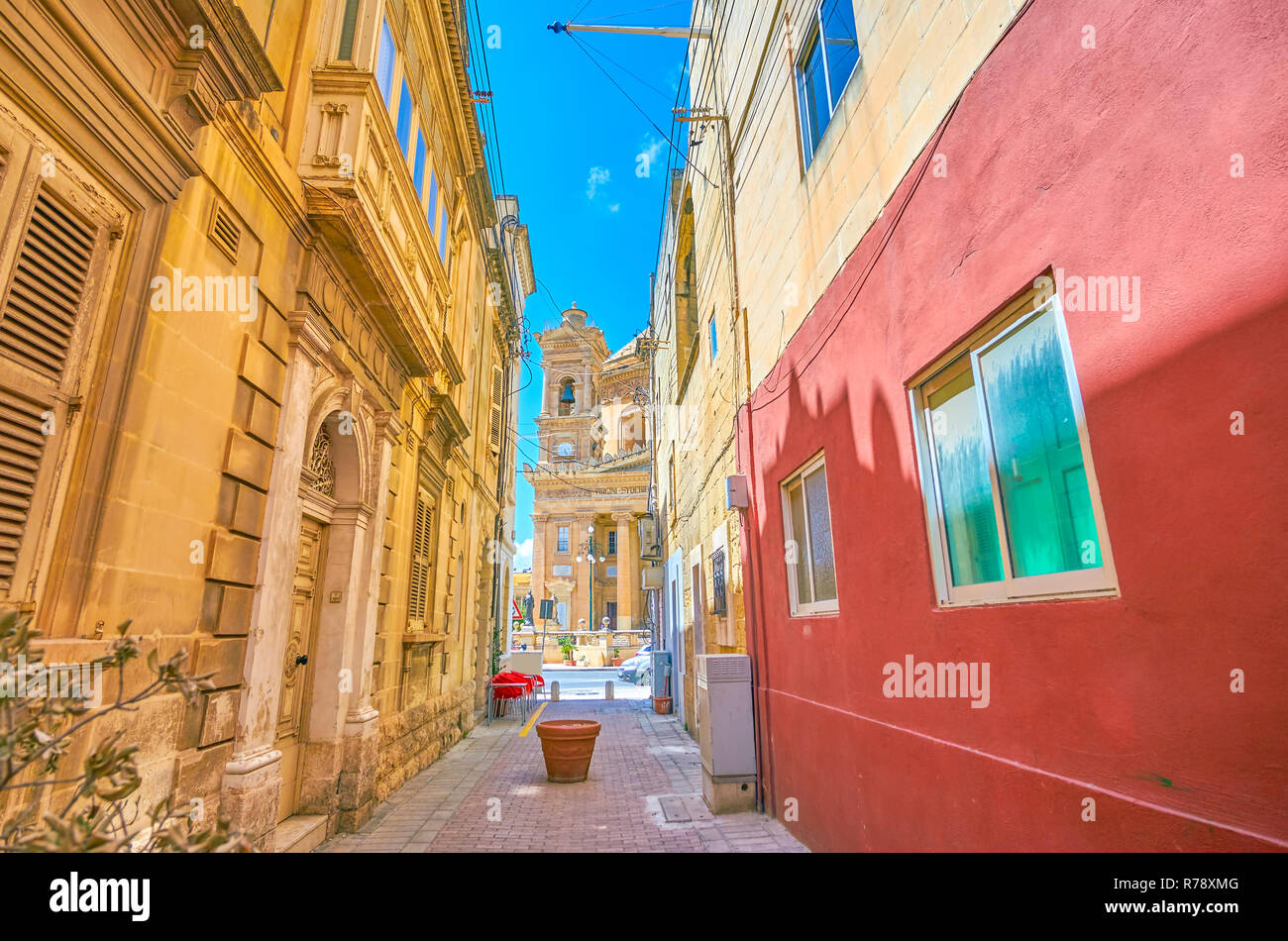 The small town Mosta in the middle of the island boasts cozy narrow streets, typical Maltese houses and huge Basilica Rotunda in the town's center. Stock Photo