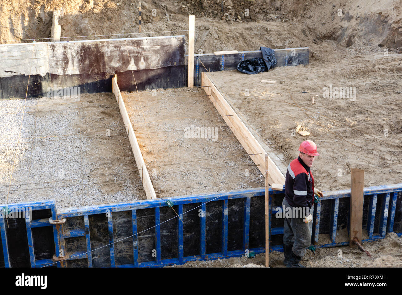 workers make metal reinforcement for the concrete foundation-Russia ...