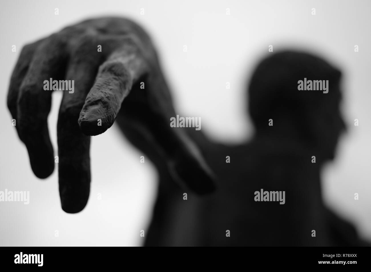 Bronze Statue finger pointing Stock Photo