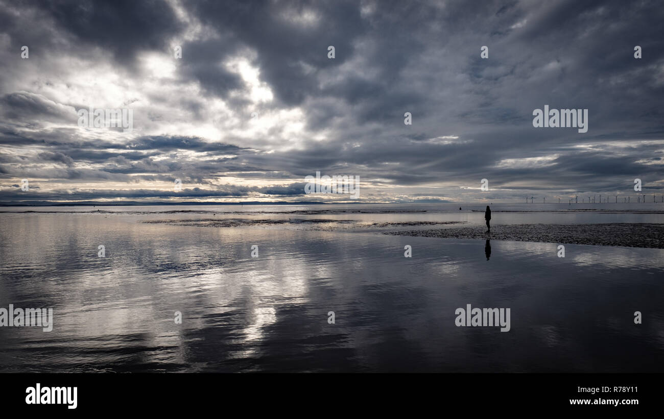 Contemplation, reflection and mindfulness on the beach Stock Photo