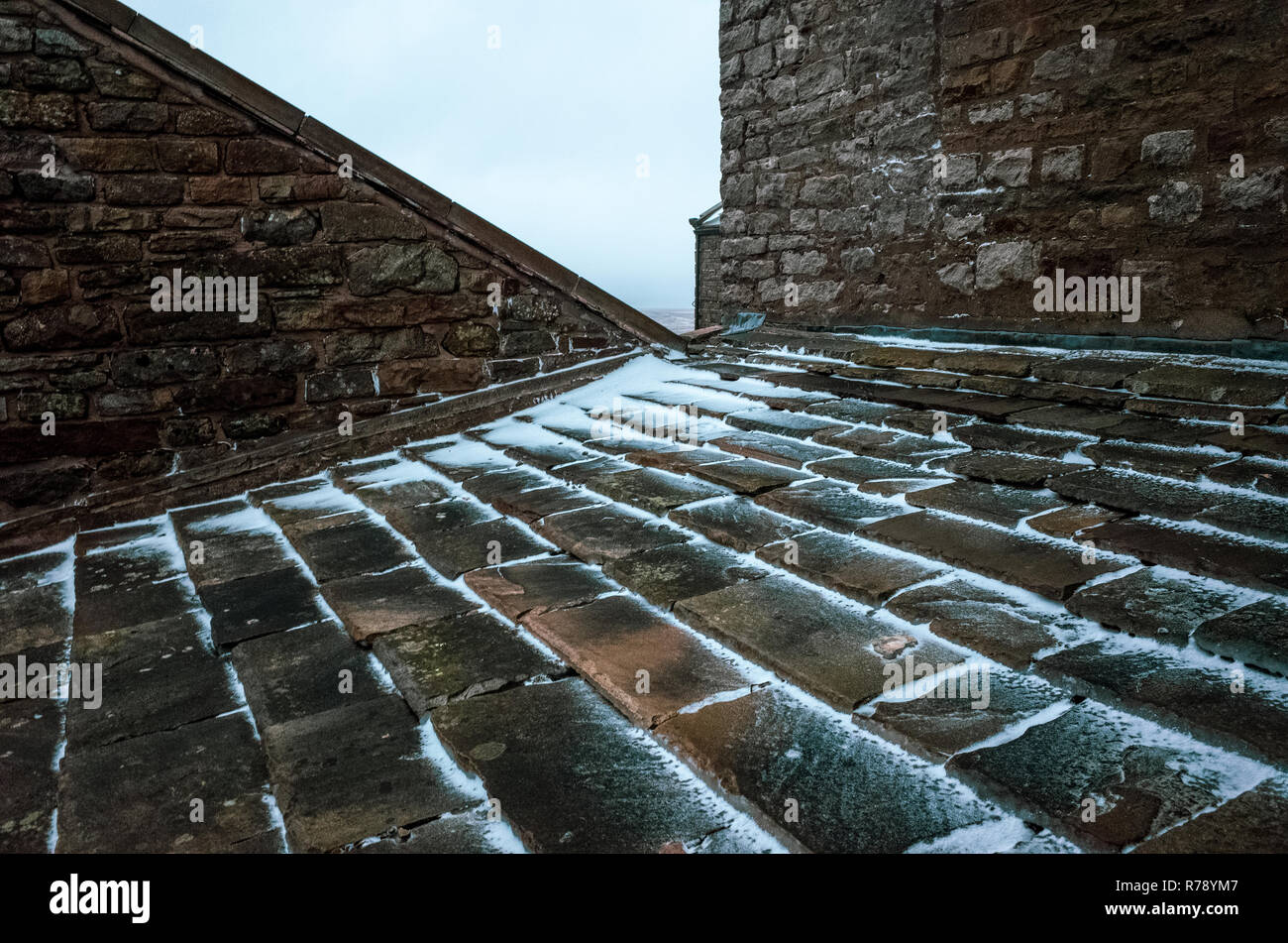 Snow on a tiled roof, Yorkshire Dales Stock Photo