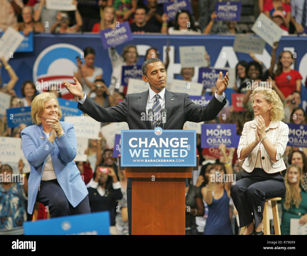 Democratic presidential candidate Senator Barack Obama, flanked by Sen. Claire McCaskill (L) and Rep. Debbie Wasserman Schults speaks at a rally at the BankUnited Center in Coral Gables, Florida on September 19, 2008. Stock Photo