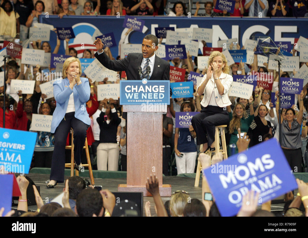 Democratic presidential candidate Senator Barack Obama, flanked by Sen. Claire McCaskill (L) and Rep. Debbie Wasserman Schults speaks at a rally at the BankUnited Center in Coral Gables, Florida on September 19, 2008. Stock Photo