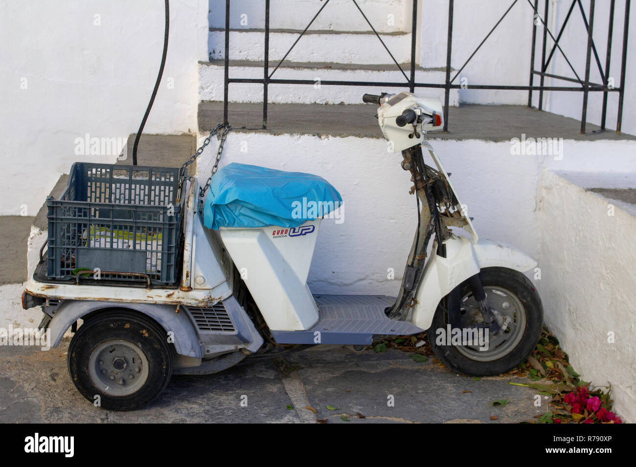 A small Honda GYRO used here as a delivery vehicle to navigate the narrow streets of lindos, Rhodes,Greece. Stock Photo