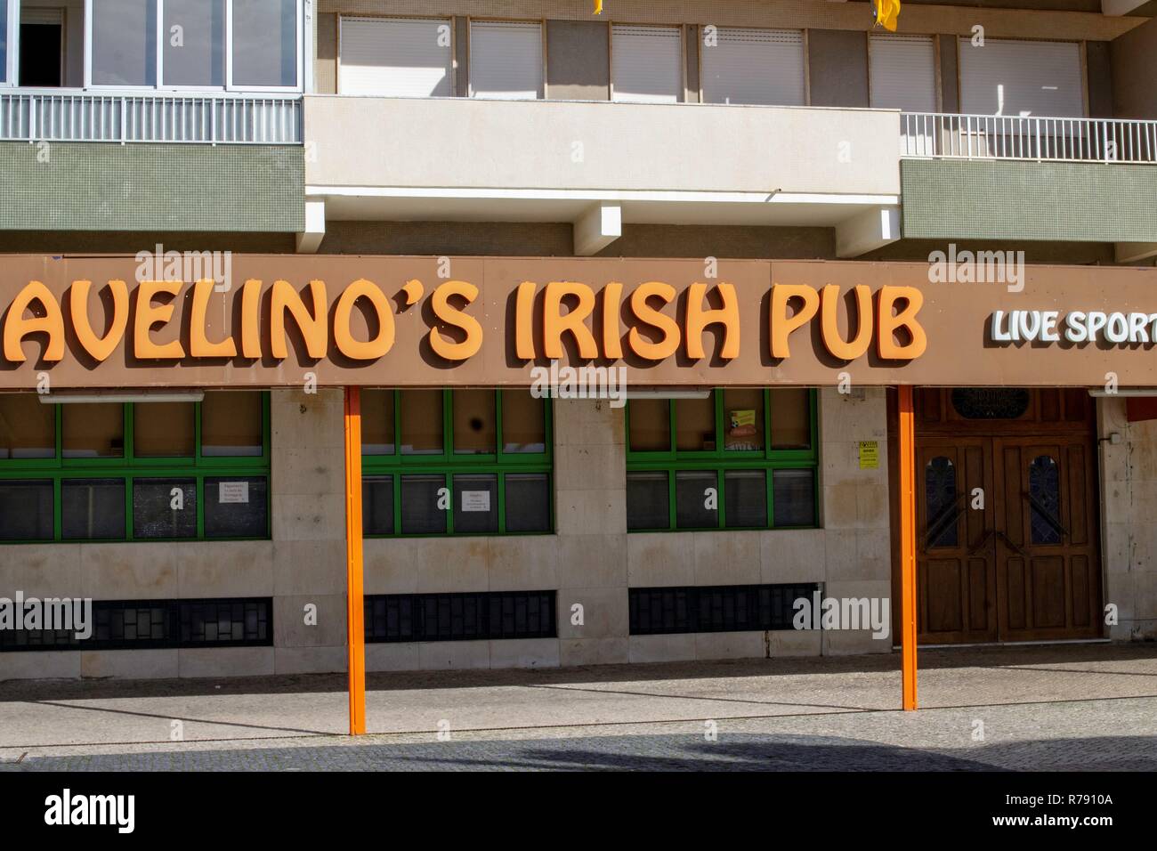 Avelino's Irish Pub on the sea front of Quarteira, Portugal Stock Photo