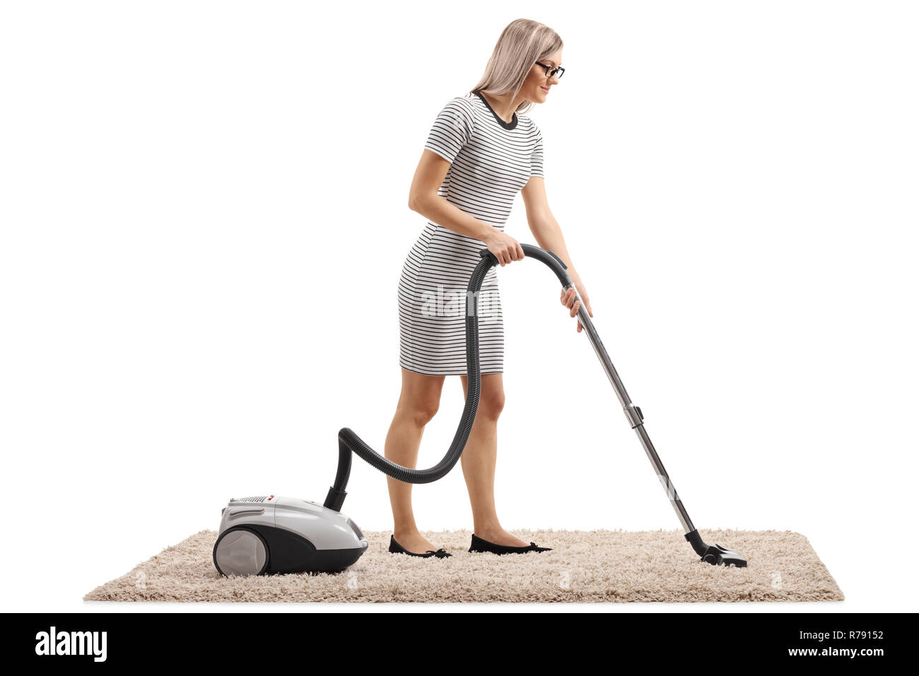 Woman vacuum cleaner cleaning carpet hi-res stock photography and ...