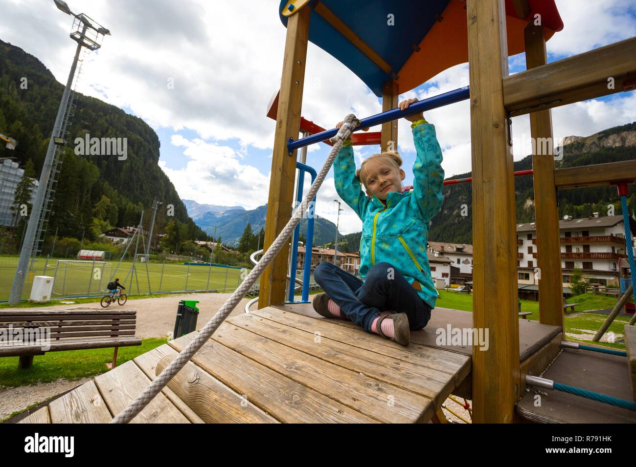 smiling little girl at the playground, Canazei, Italy Stock Photo - Alamy