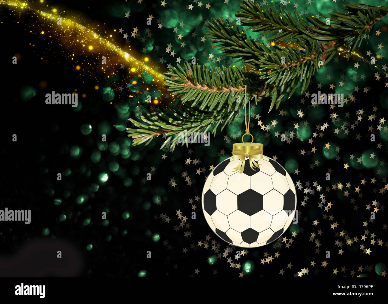 Soccer christmas ball hanging on the fir branch Stock Photo
