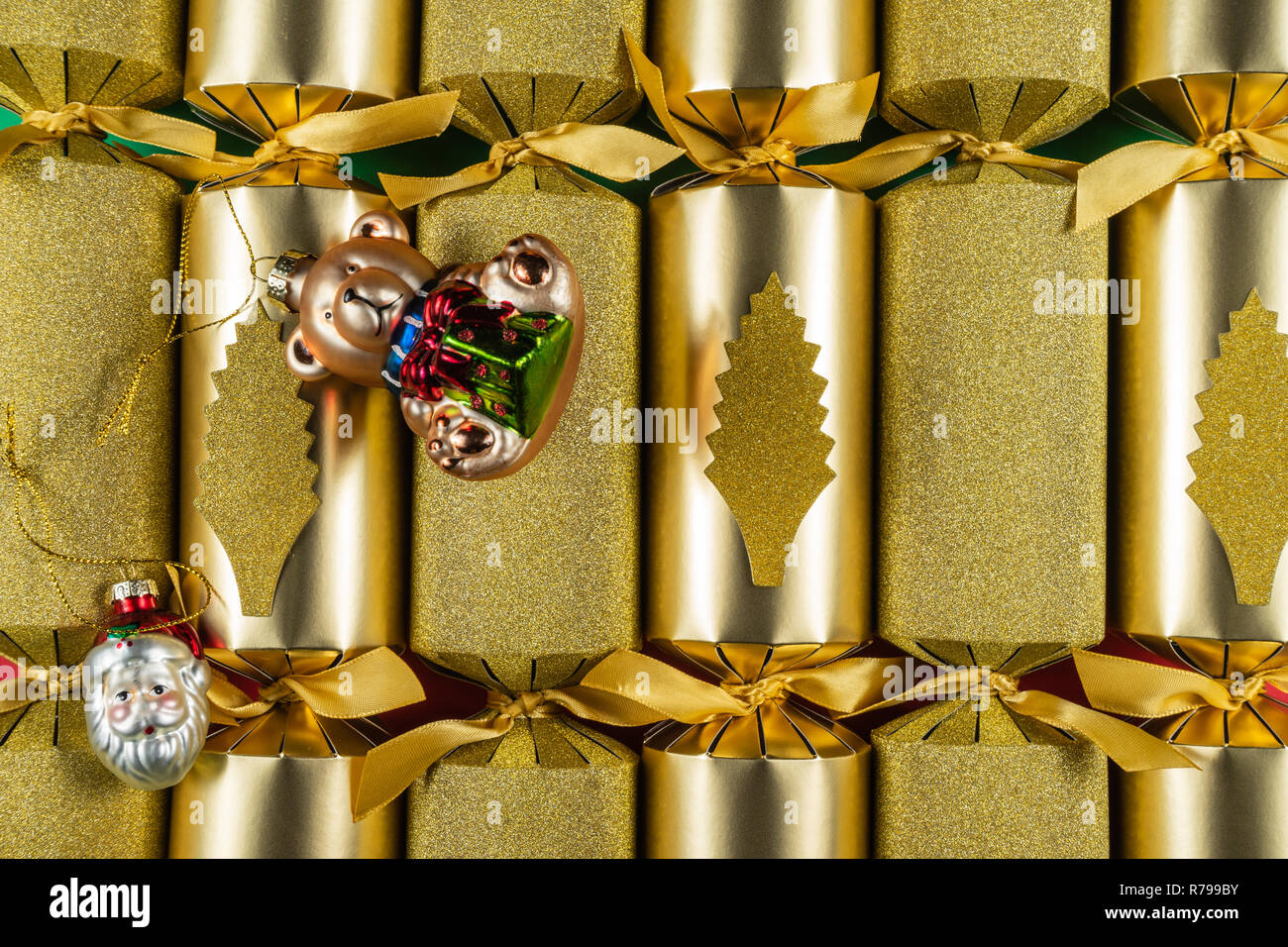 Gold Christmas Crackers. Christmas Tableware.Party Games. Stock Photo
