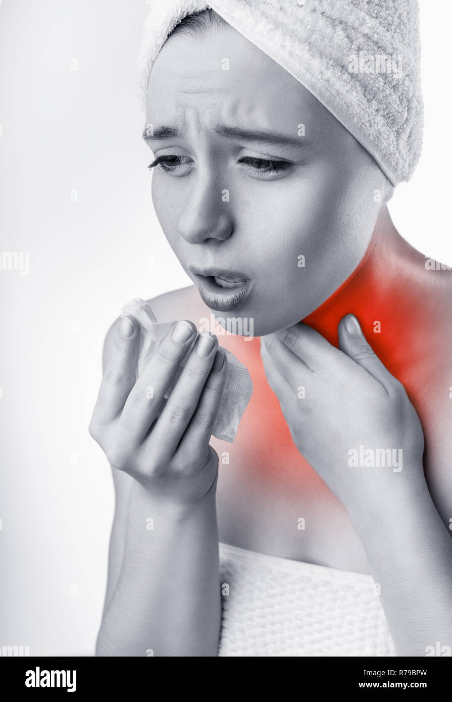 Woman holding his throat in pain. Medical concept. Black and white photo Stock Photo