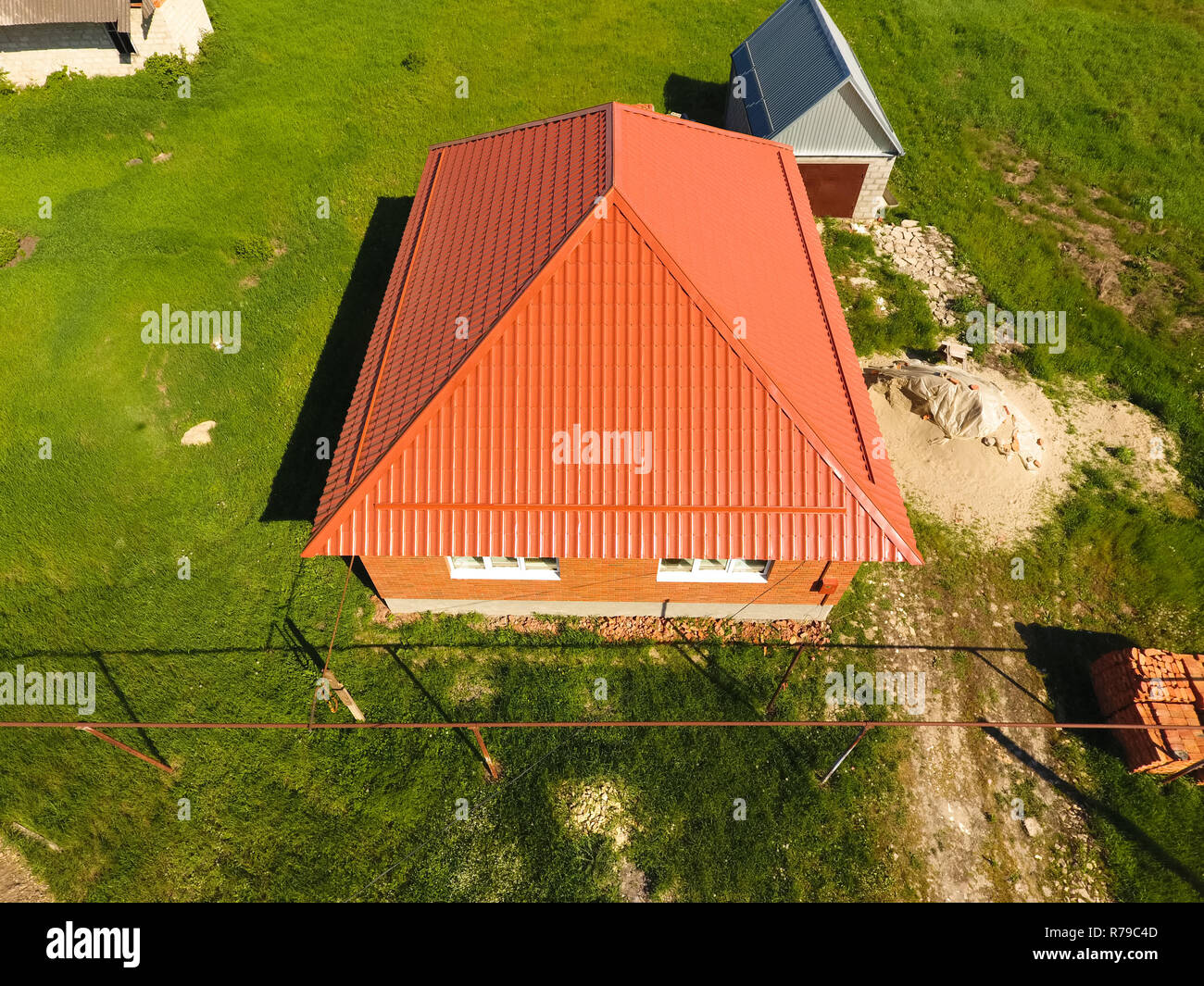 House With An Orange Roof Made Of Metal Top View Metallic Profile Painted Corrugated On The Roof Stock Photo Alamy