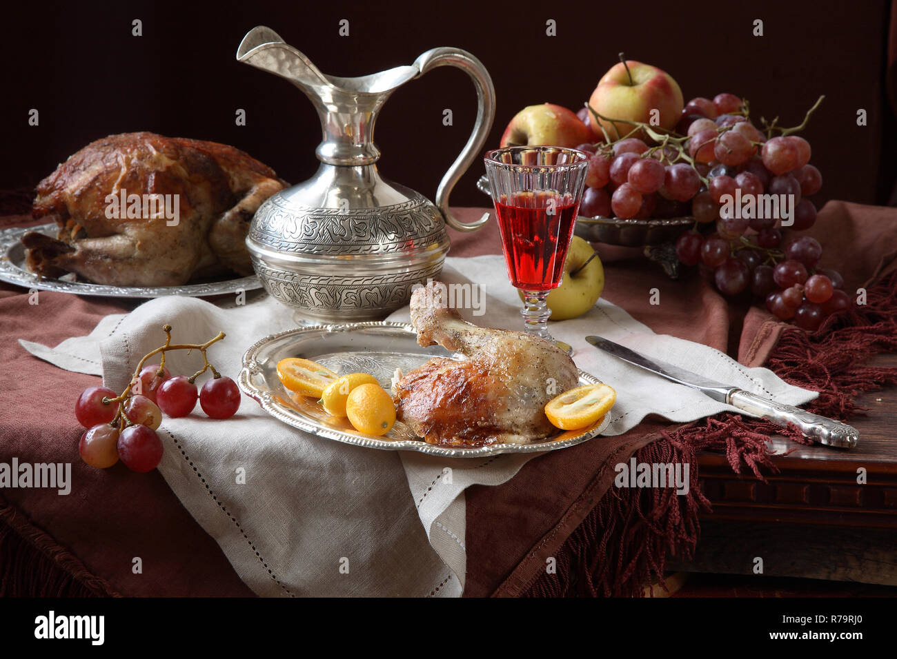 Still Life with roast Chicken, Red Wine and Fruit Stock Photo - Alamy