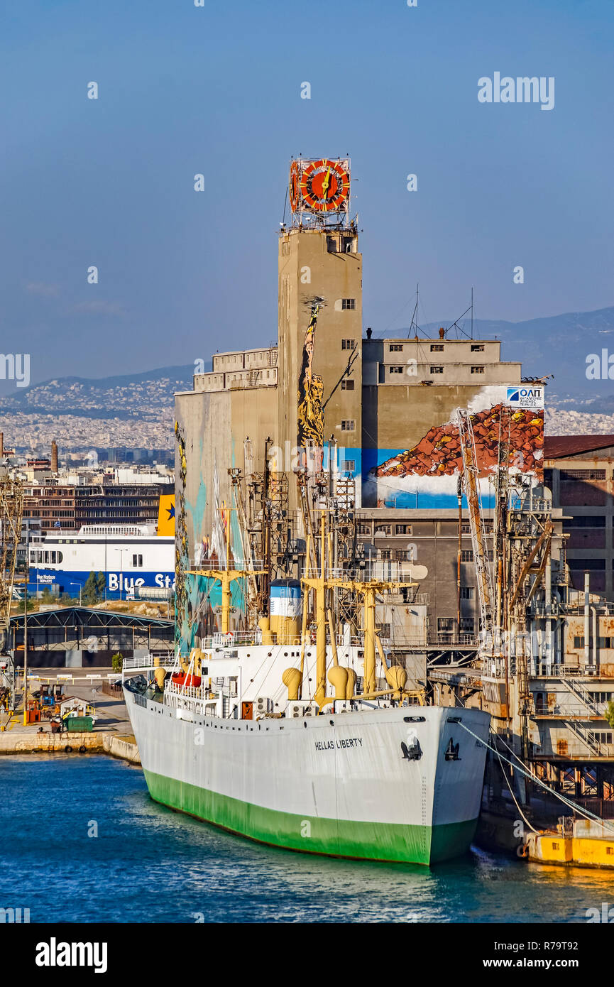 Freighter Hellas Liberty moored in port of Piraeus Athens Greece Europe Stock Photo