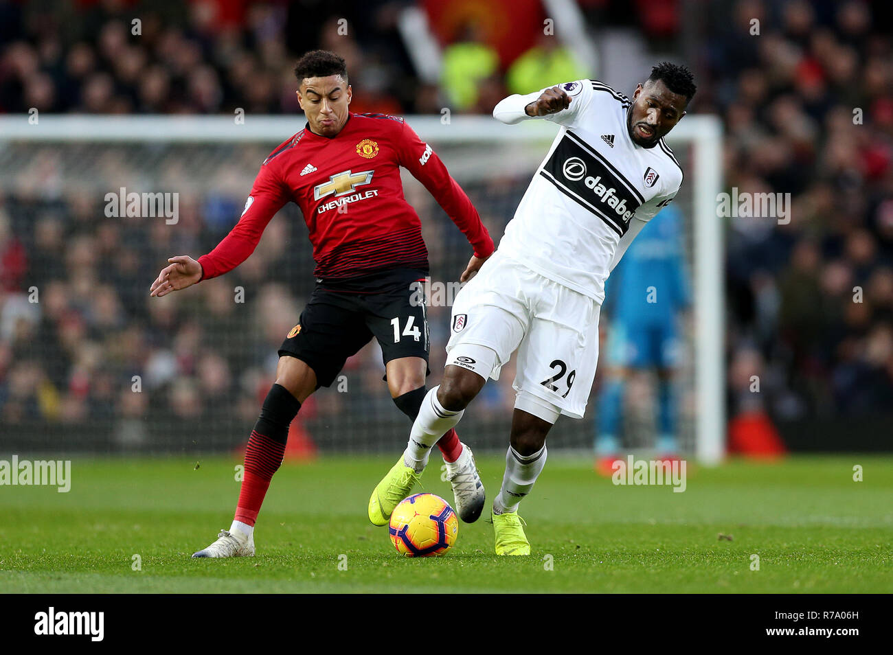 Manchester United S Jesse Lingard Left And Fulham S Andre Frank Zambo Anguissa Right Battle For The Ball During The Premier League Match At Old Trafford Manchester Stock Photo Alamy
