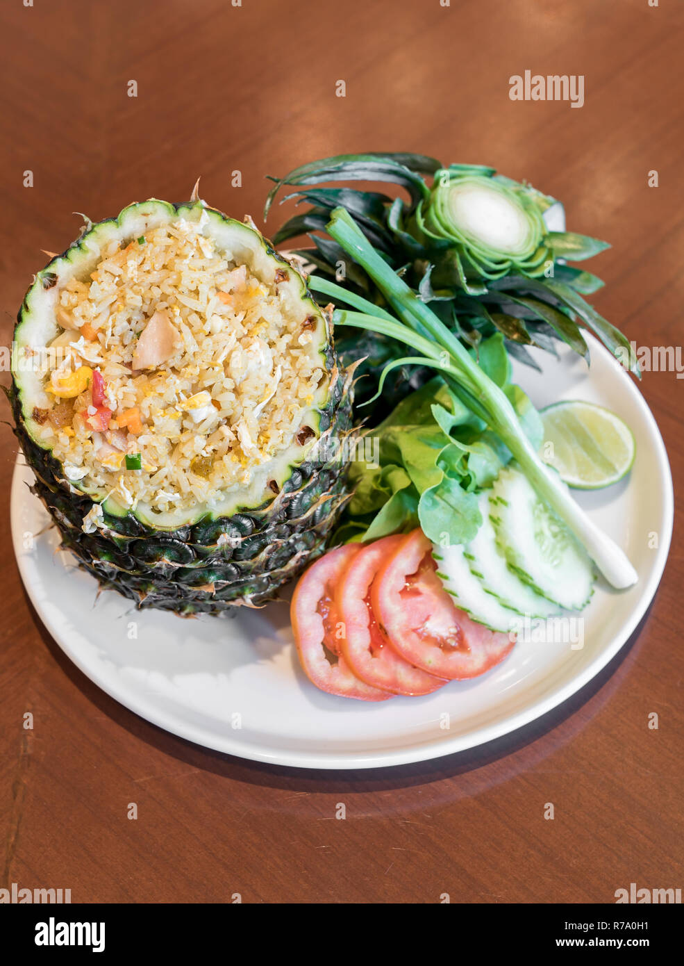Pineapple fried rice serve in whole pineapple Stock Photo Alamy