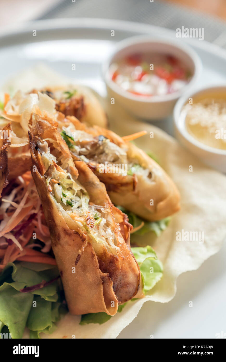 Deep fried Spring roll in white plate Thai food Stock Photo