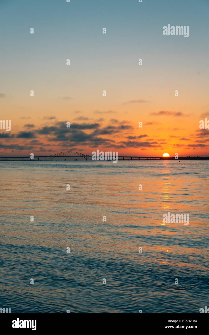 Sunset over the Robert Moses Causeway from Fire Island, New York Stock Photo