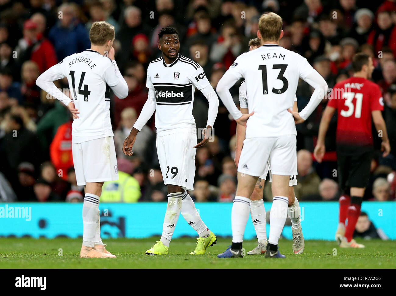 Fulham S Andre Frank Zambo Anguissa Centre Leaves The Pitch After Being Sent Off During The Premier League Match At Old Trafford Manchester Stock Photo Alamy